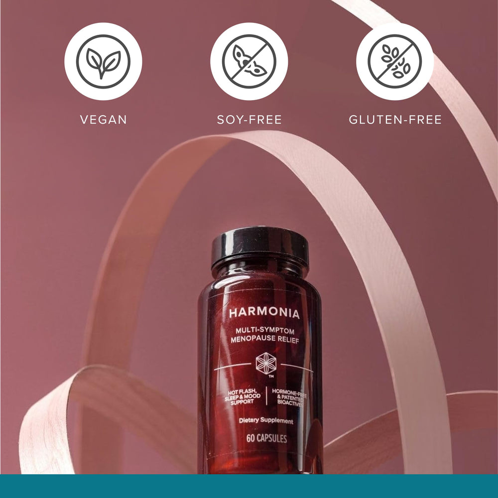 Harmonia bottle with glass showing easy-to-use daily capsules