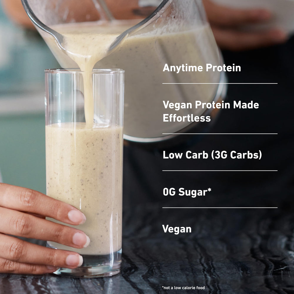 Isopure protein powder scoop beside a blender for easy prep
