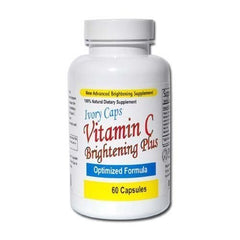 Close-up of Ivory Caps Brightening Plus capsules highlights a bioavailable vitamin C blend