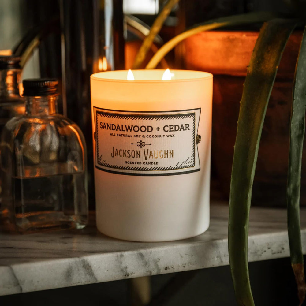 Jackson Vaughn Daily Rituals frosted glass jar candle in a minimalist room.