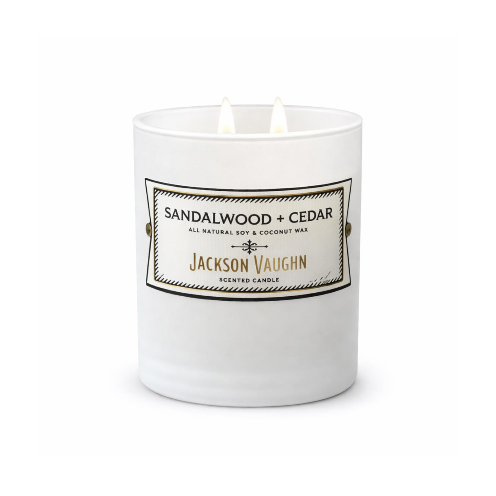 Jackson Vaughn Daily Rituals sandalwood cedar candle in frosted jar adds cozy ambience.