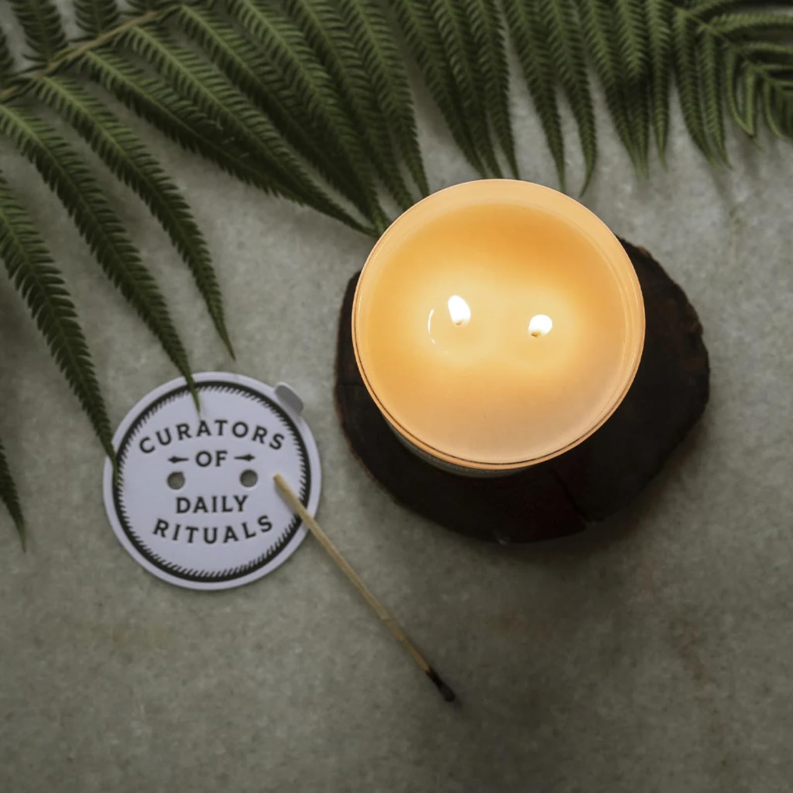 Jackson Vaughn natural cotton wick candle with up to 30 hours burn time.