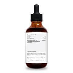 Jantu Pine Pollen bottle in forest setting highlights natural sourcing.