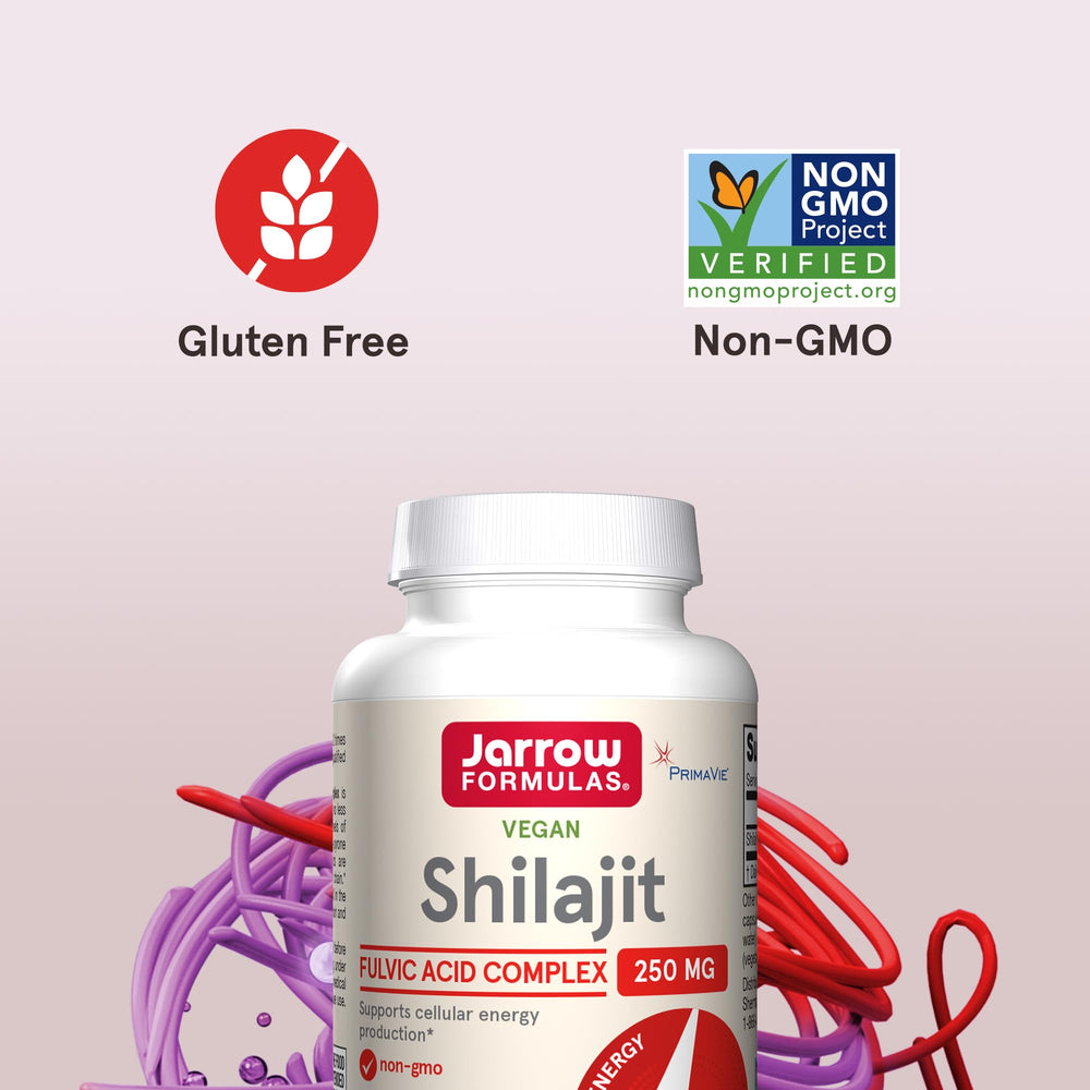 Shilajit capsules held in hand for daily use