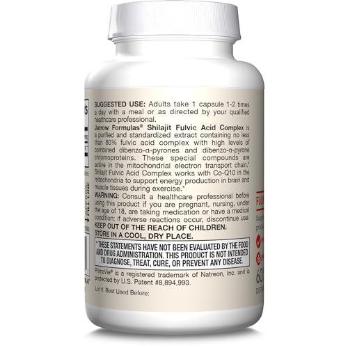 Shilajit bottle beside a meal and water for convenient consumption