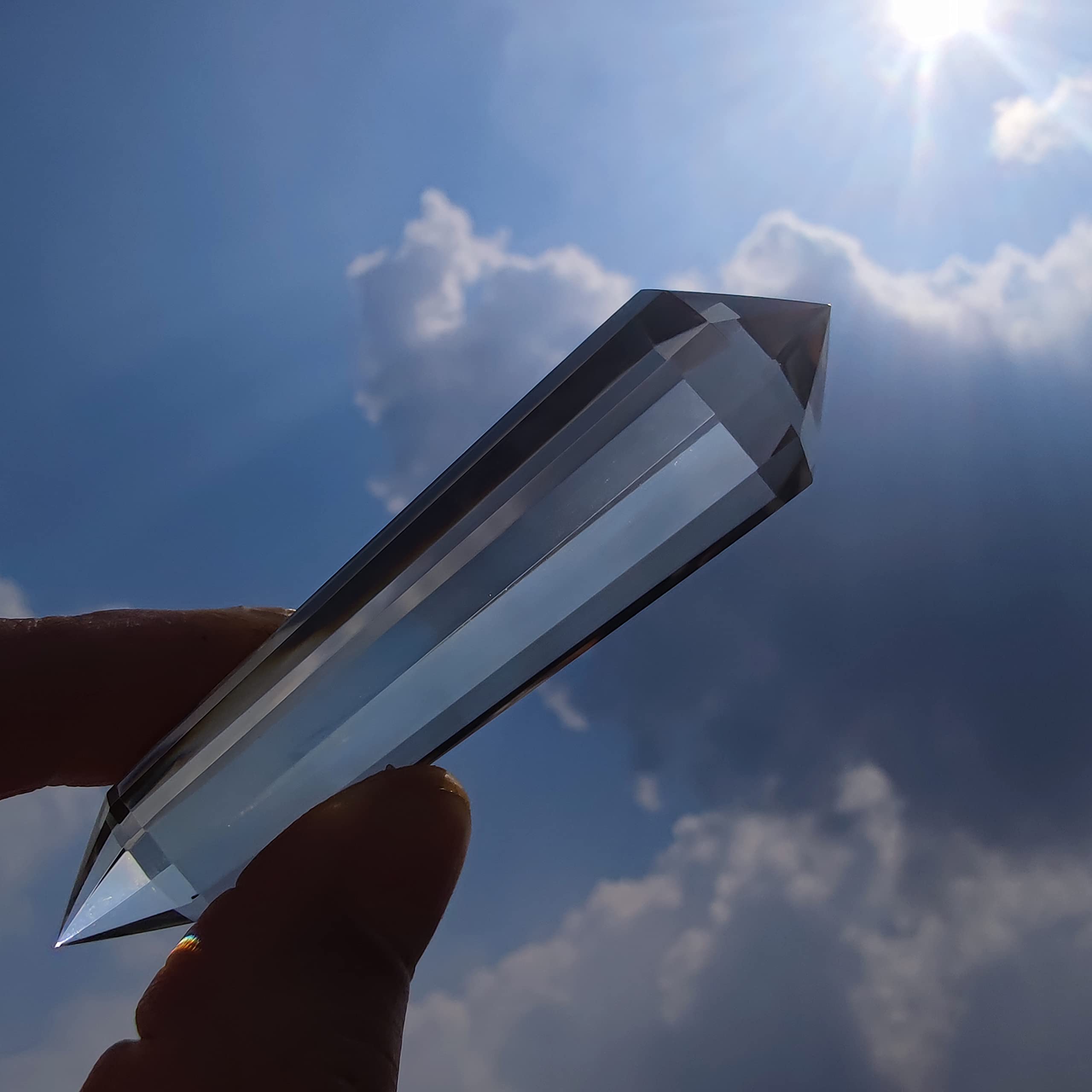 JDFlying double-terminated smoky quartz wand guiding energy in practice.