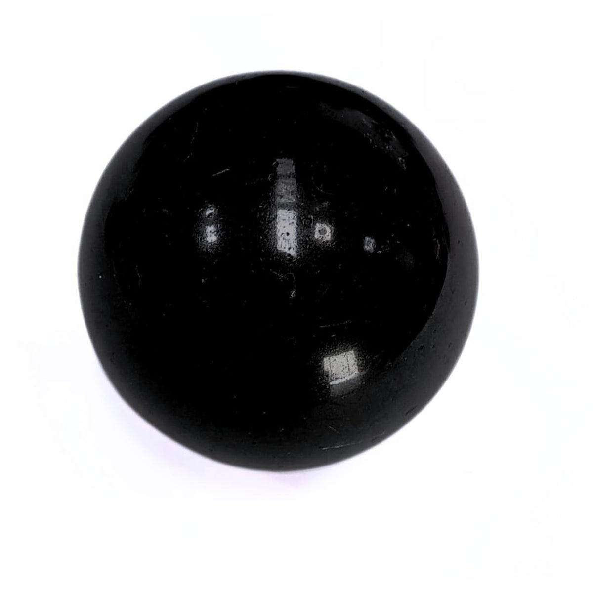 Jet International Jet Black Tourmaline Ball front view for protective display and grounding energy.