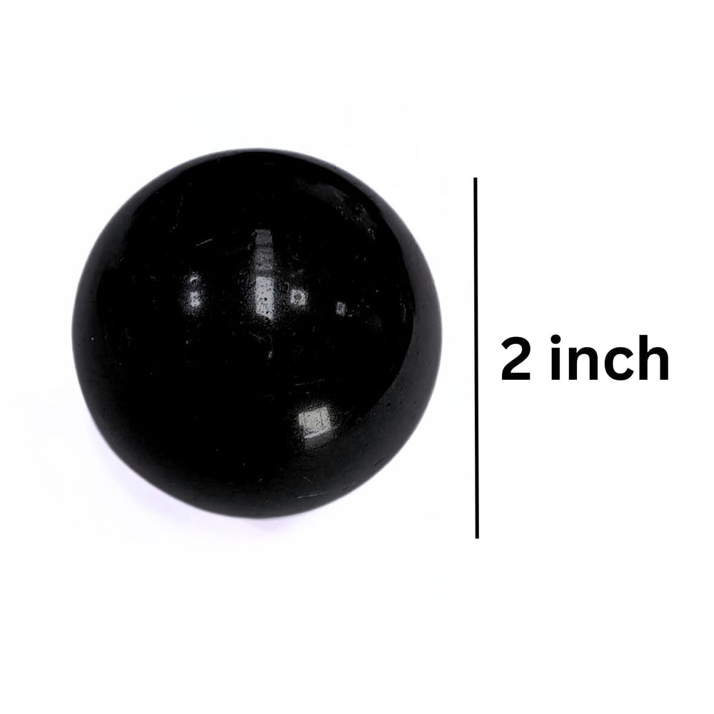 Jet International Jet Black Tourmaline Ball side view highlighting grounded energy in living spaces.