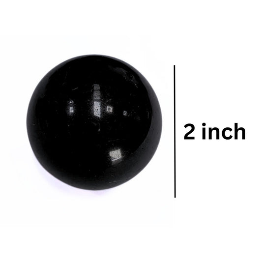 Jet International Jet Black Tourmaline Ball side view highlighting grounded energy in living spaces.