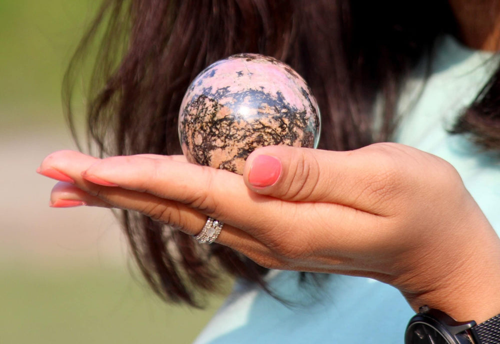 Jet International Rhodonite Sphere adds elegant desk or room decor and vibes.