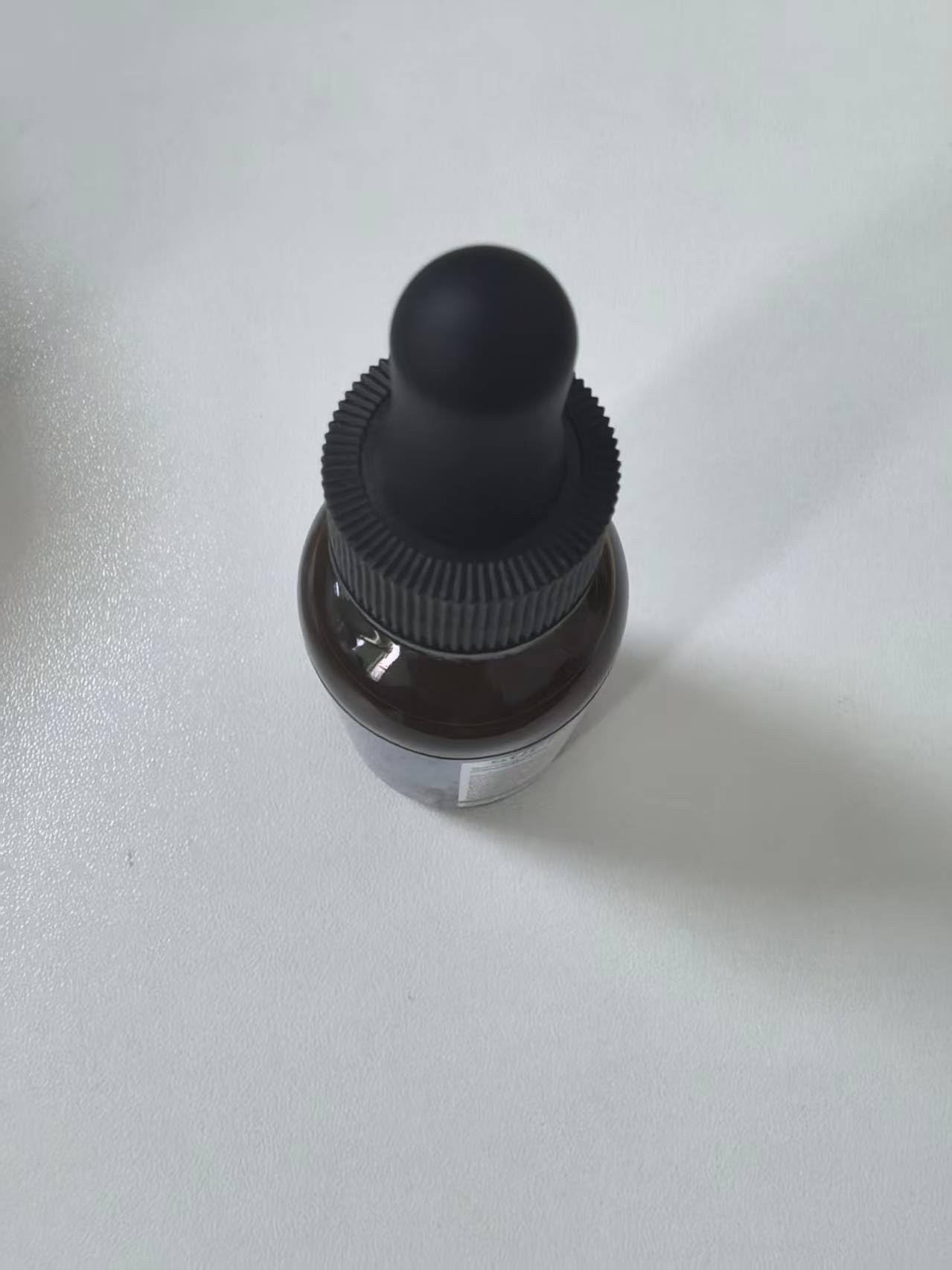 JIANKYTZ bottle on the counter suggests convenient, travel-friendly use.