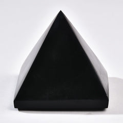 JIC Gem Black Obsidian Pyramid displayed in the living room for subtle energy.
