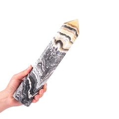 JIC Gem black-yellow calcite obelisk tower front view for energy focus