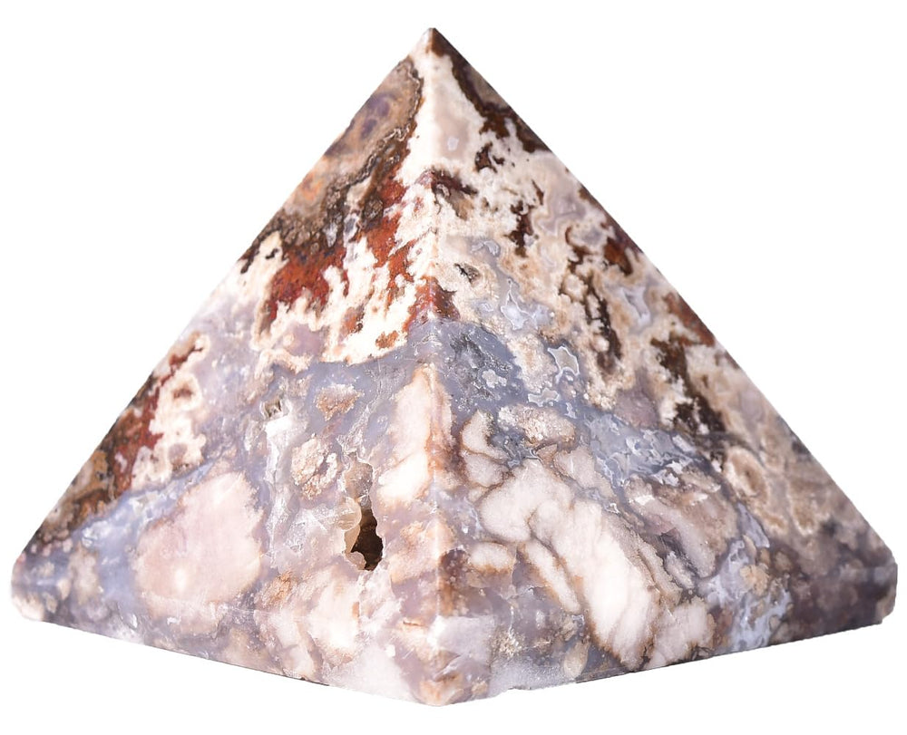 JIC Gem blue cherry blossom agate pyramid on desk for calm focus.
