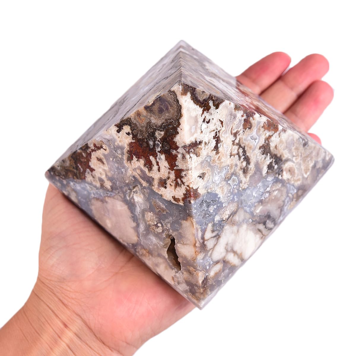 JIC Gem blue cherry blossom agate pyramid radiates calming energy during meditation.
