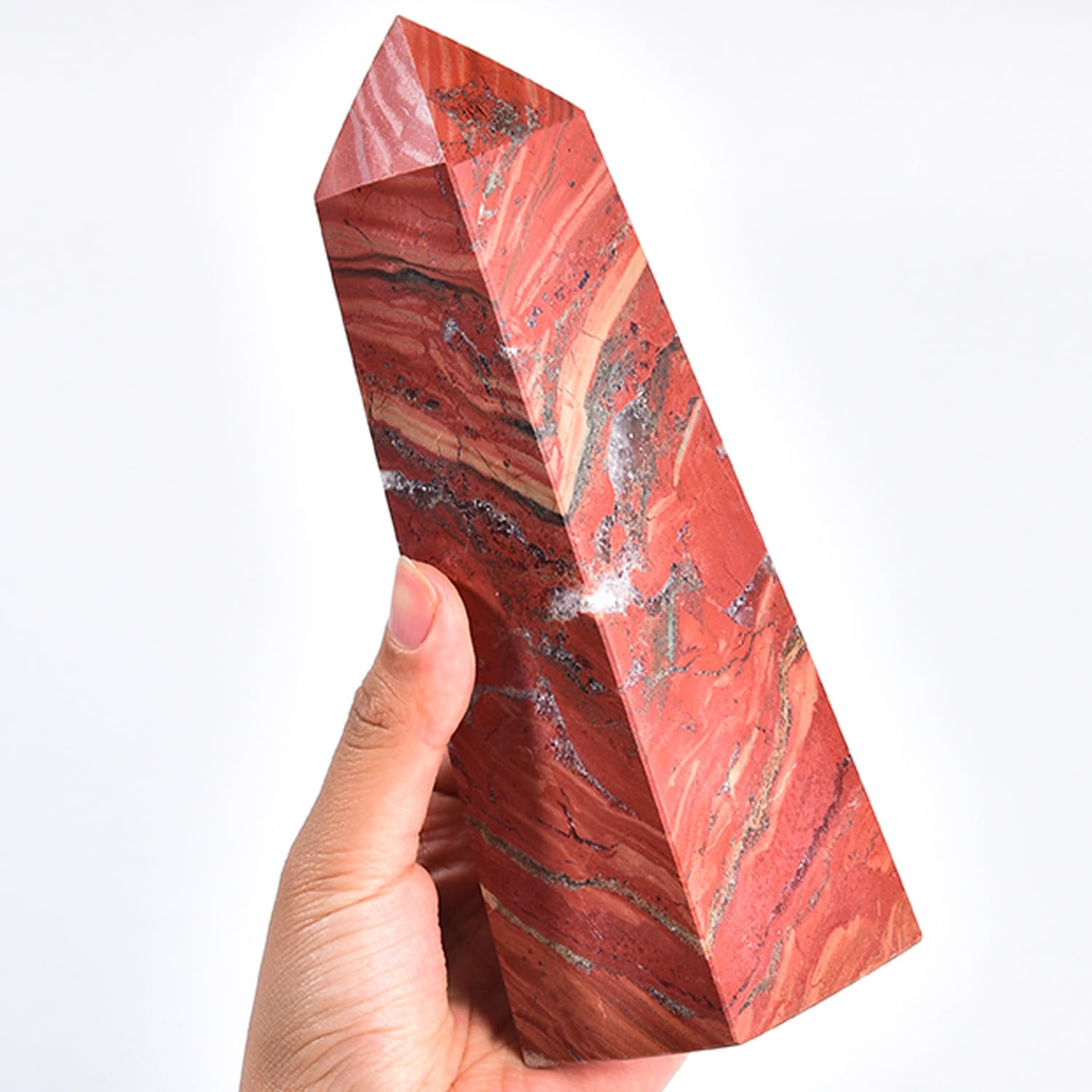 JIC Gem red Jasper crystal tower close-up showing natural color variations.
