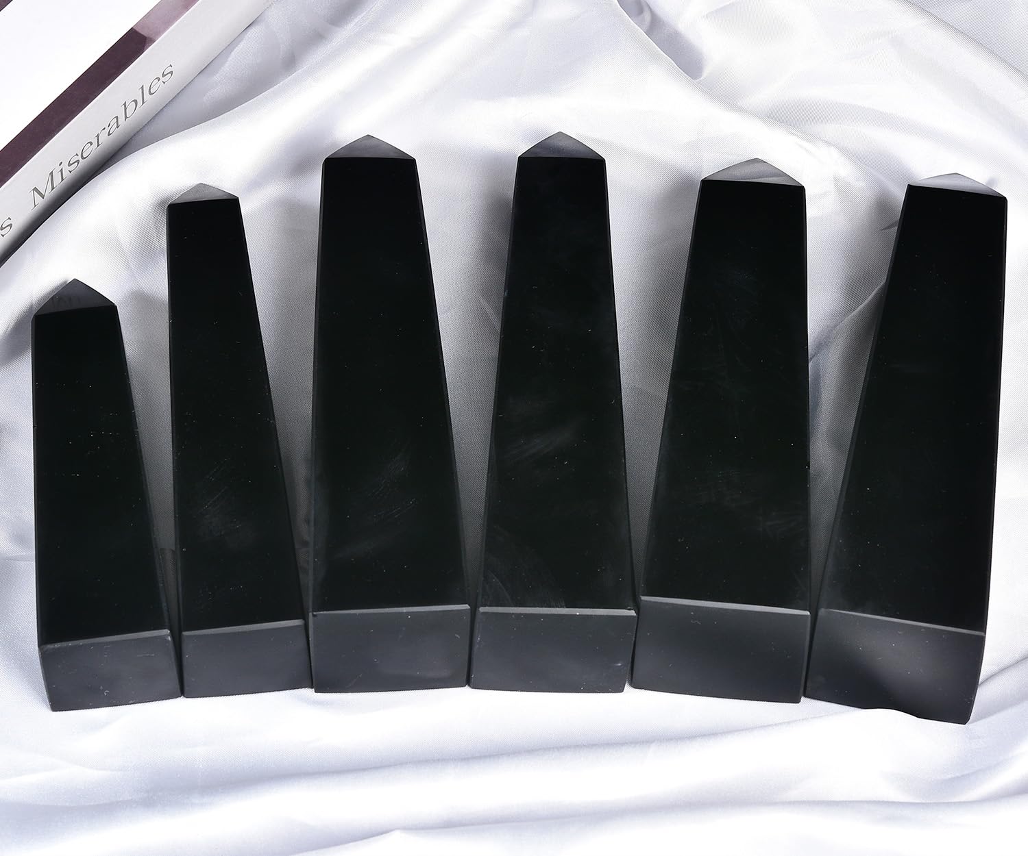 JIC Gem obsidian crystal point used for meditation and focus.