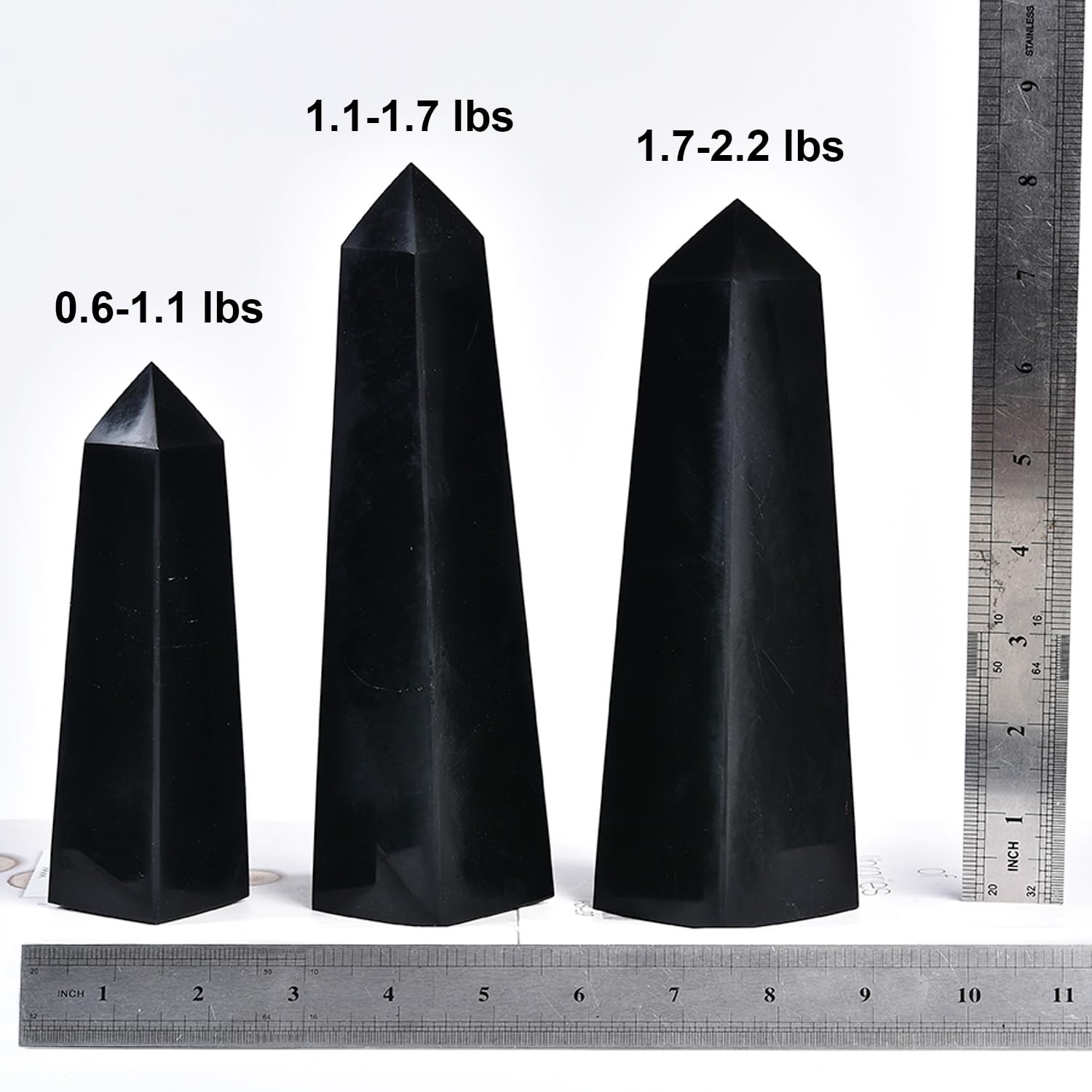 JIC Gem energy-grid display with black obsidian wand centerpiece.