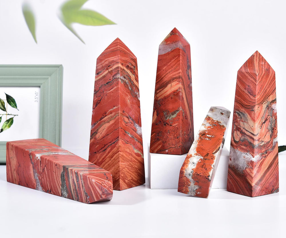JIC Gem red jasper crystal tower in a meditation scene showing grounding ambiance
