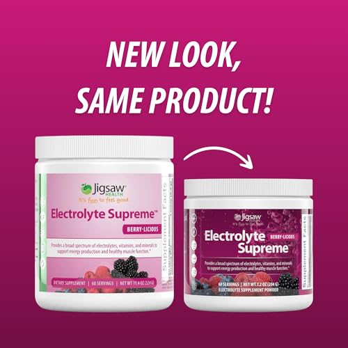 Jigsaw Electrolyte Supreme Berry-Licious powder scoop beside the jar for easy dosing.