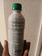 Jinja Herbal Extract label closeup highlighting natural ingredients