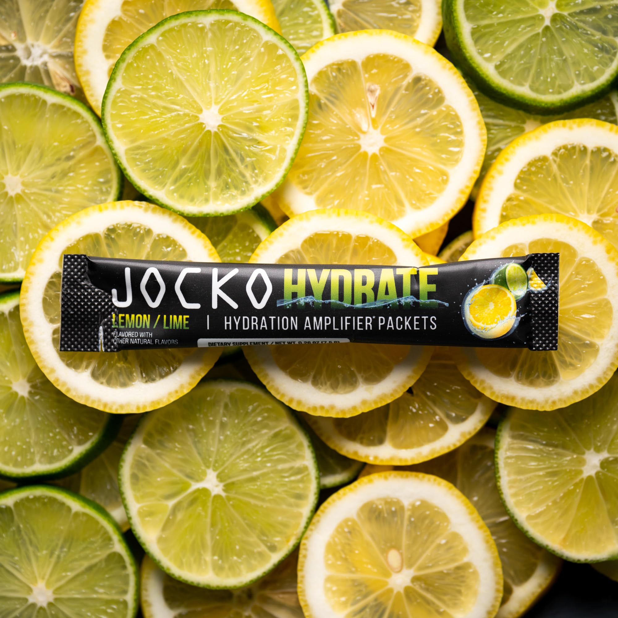 Jocko Fuel Packets Lemon Lime travel setup with bottle for on-the-go hydration.