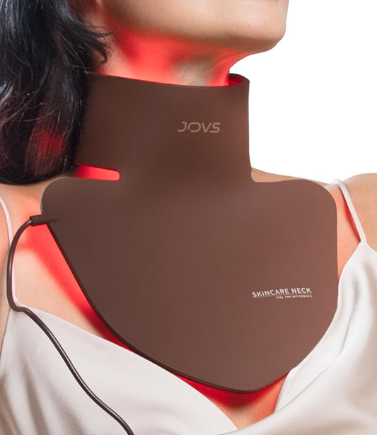 JOVS LED neck and chest mask on skin smoothing lines.