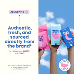 JoySpring Kids B Complex bottle with glasses illustrates measured serving.