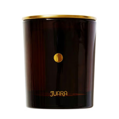 Juara Joy Candle with tropical floral fragrance close-up in a reusable glass vessel