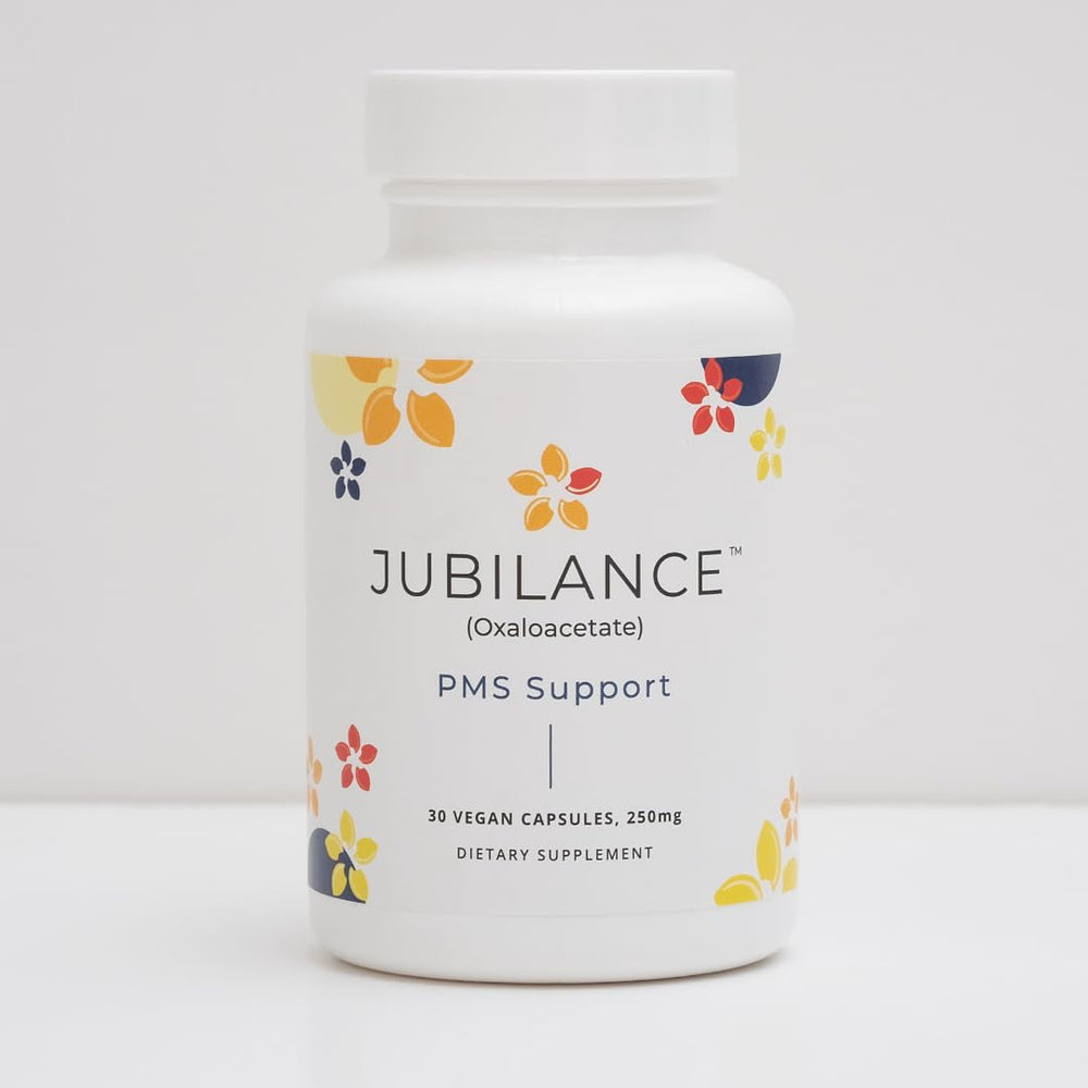 Close-up of Jubilance oxaloacetate capsule showing smooth coating.