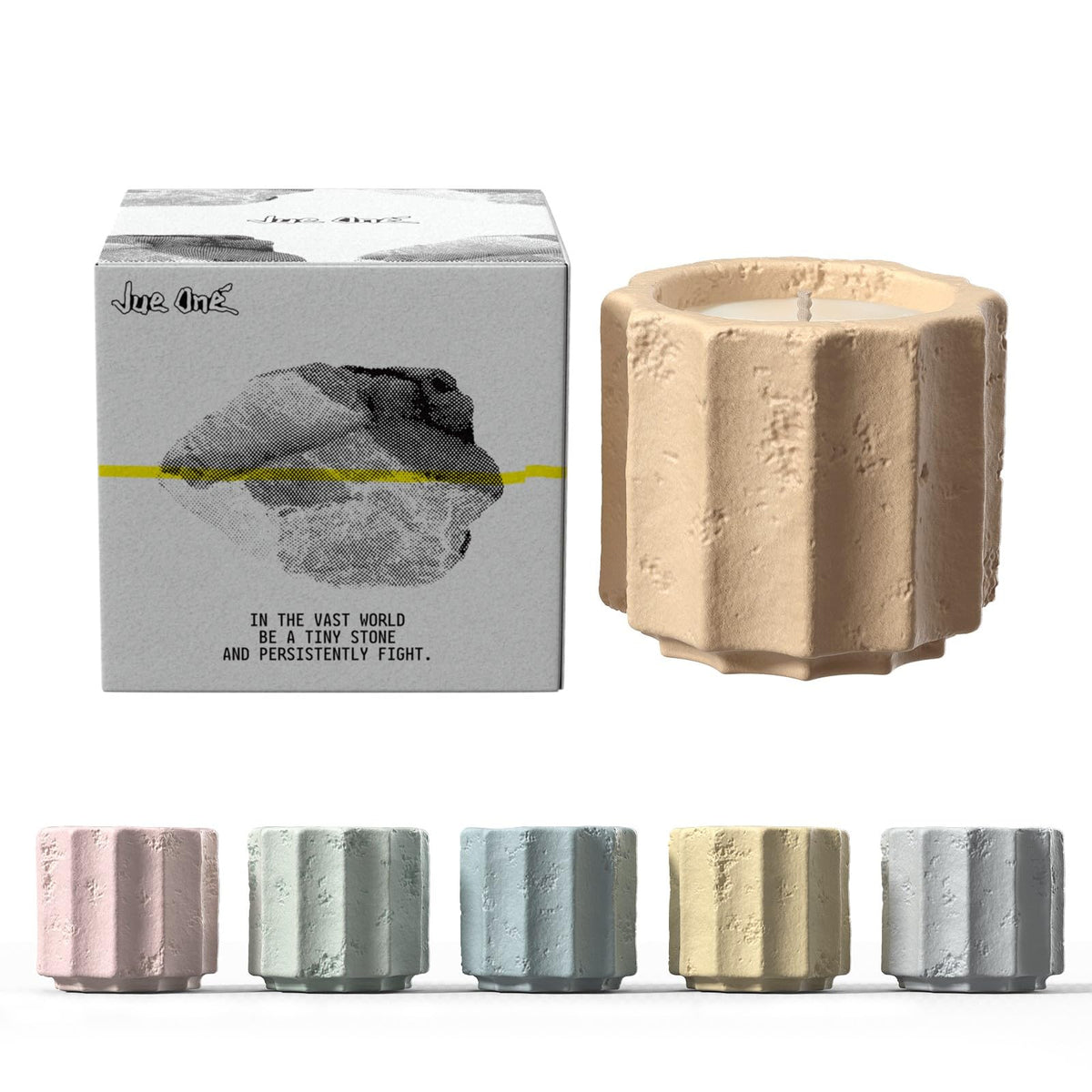 JueOne candles front view in cement jars, adding refined ambience to a living space.