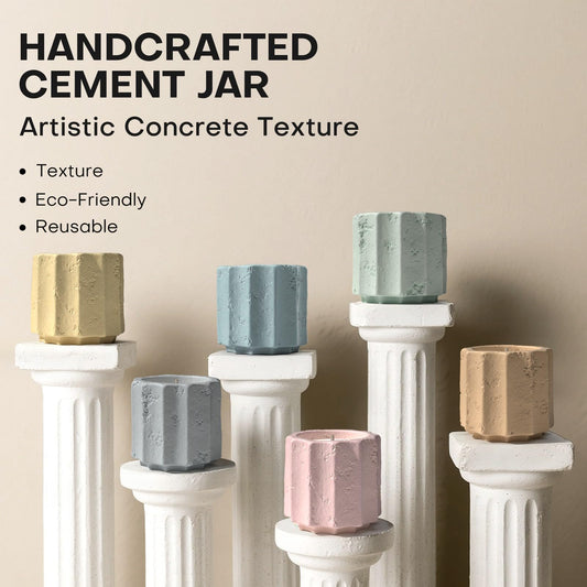 JueOne candles side detail highlights artisanal texture on cement jars.