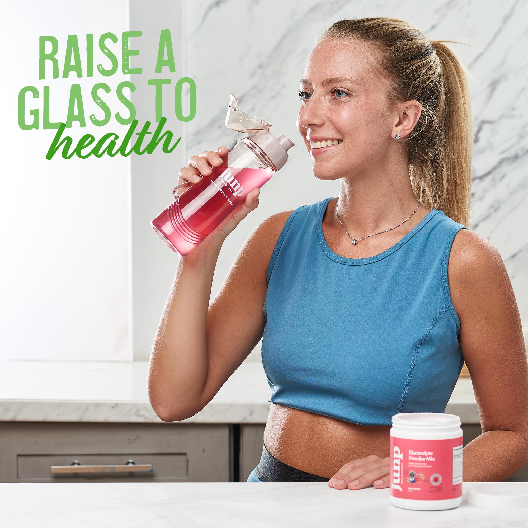 JUNP scoop with 16 oz water demonstrates easy pre-workout hydration