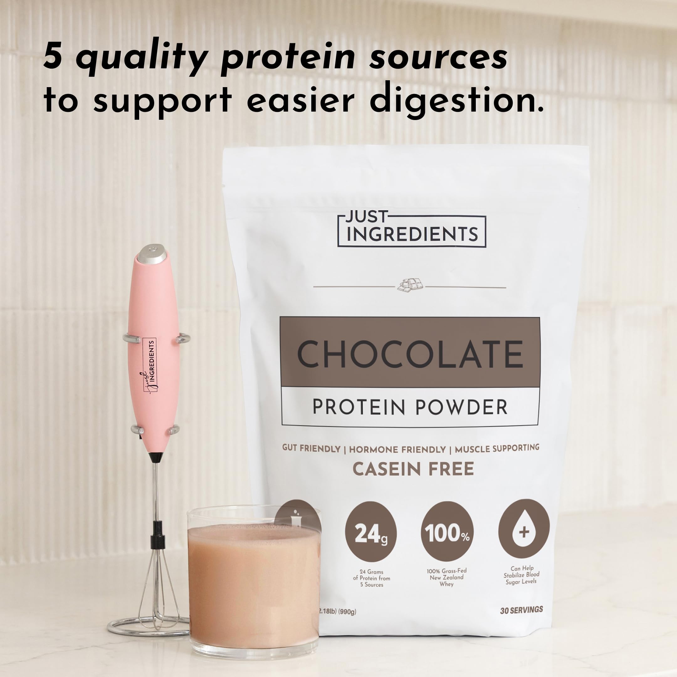 JUST INGREDIENTS chocolate protein powder shake glass with rich cocoa flavor and smooth texture