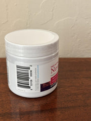 Pouring NuvoFlex capsules into hand for daily use.
