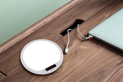JUXLamp portable design fits on a desk or bedside table for daily use