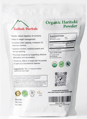 Measuring spoon beside Kailash Haritaki powder for accurate daily dosing.