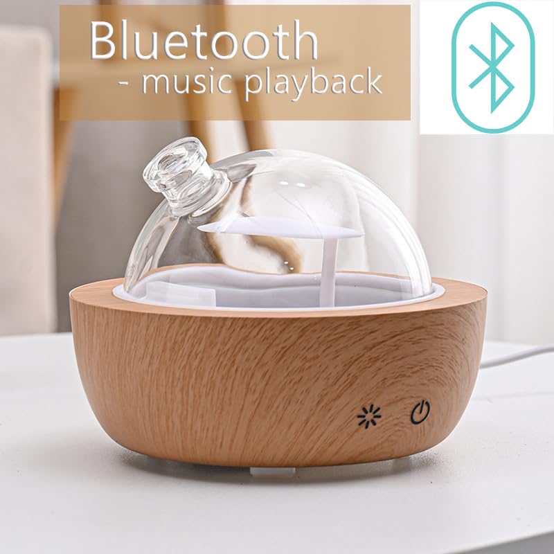 Kakoda diffuser wood base detail showing imitation grain