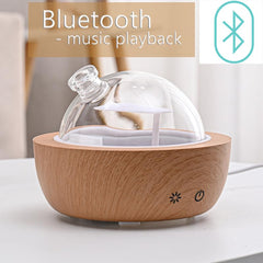 Kakoda diffuser wood base detail showing imitation grain