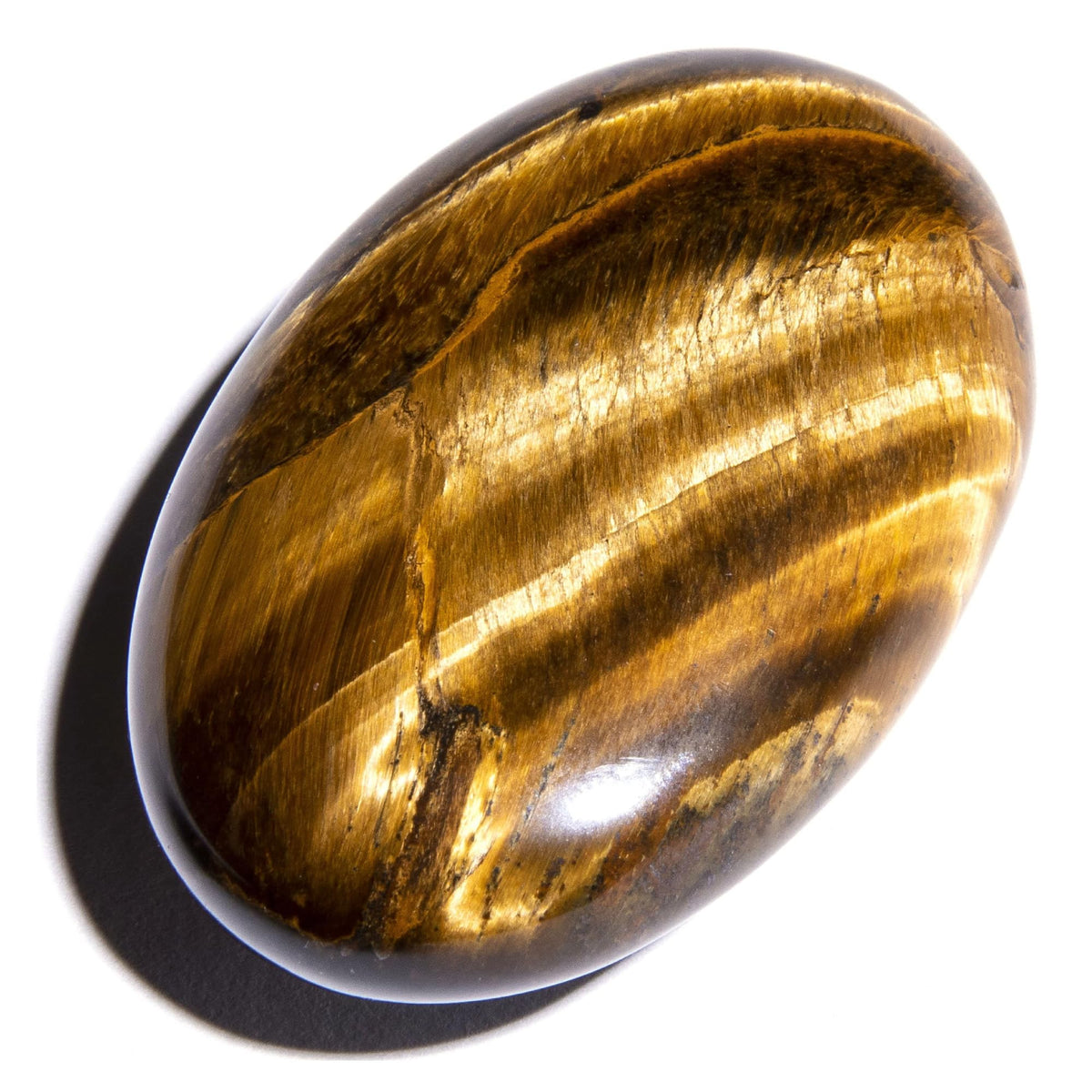 KALIFANO Tiger Eye palm stone closeup showing rich luster for energy and focus.