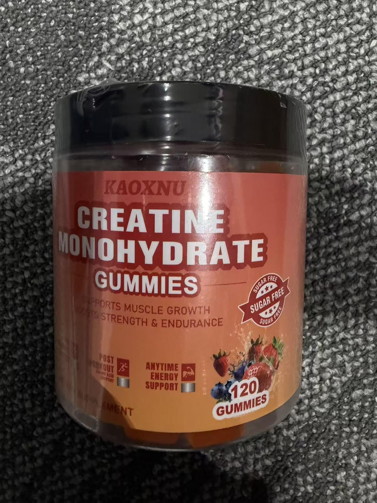 KAOXNU Creatine Gummies jar side with label visible.