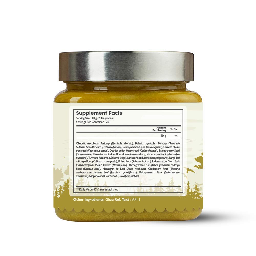 Pouring Kerala Ayurveda Kalyanaka Ghritham for daily mood balance.