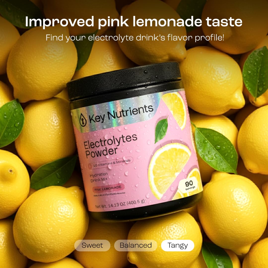 KEY NUTRIENTS pink lemonade electrolytes glass with refreshing hydration after workouts.