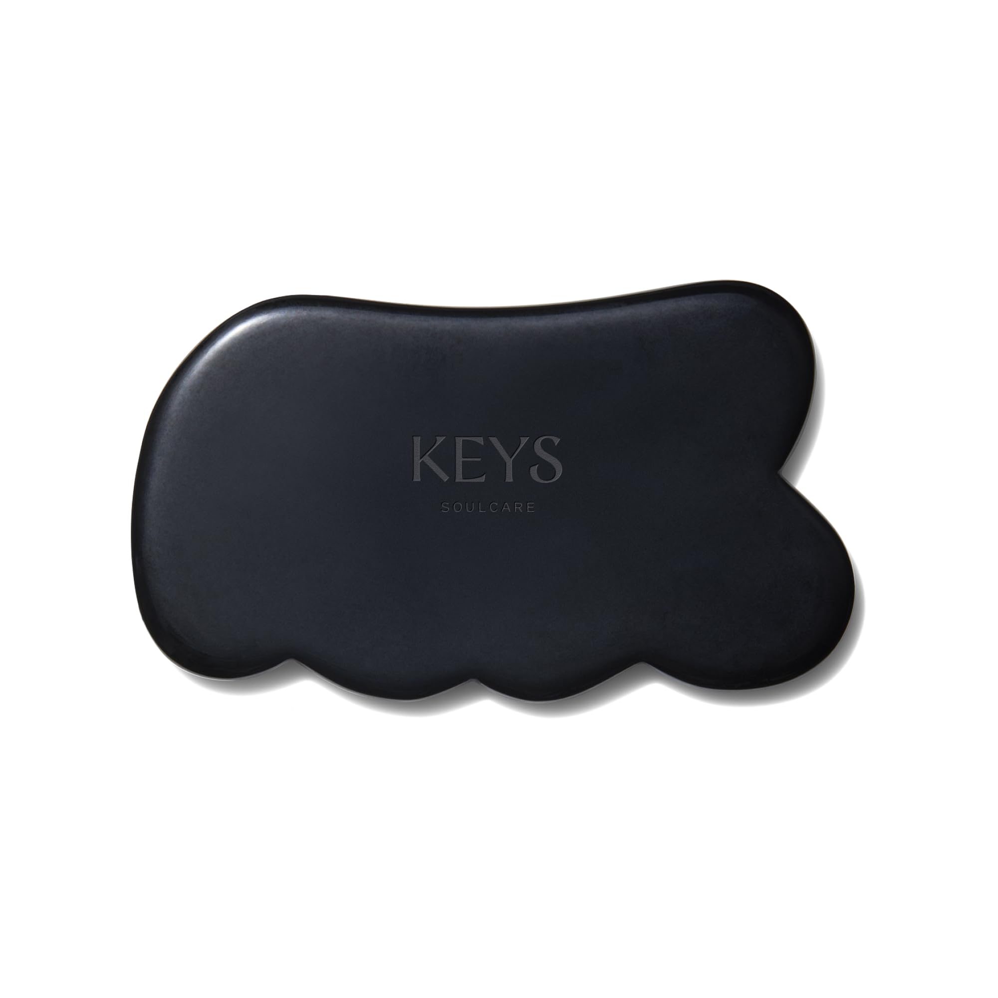 Keys Soulcare Obsidian Stone Gua Sha Tool front view for relaxing facial and body massage.