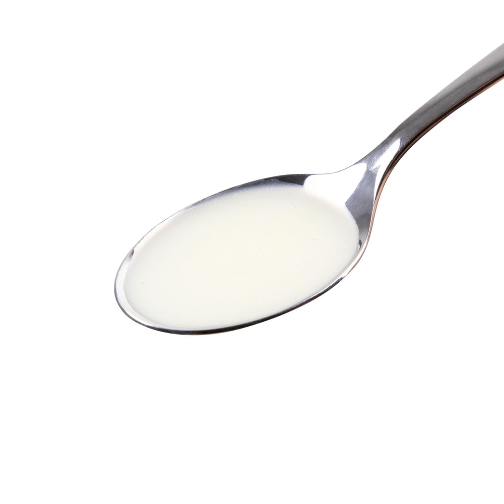KidStar BioFe+ iron liquid being poured for easy dosing.