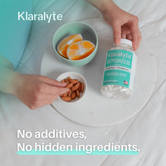 Klaralyte capsules in hand for convenient daily dosing.