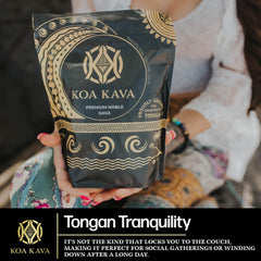 Koa Kava powder measurement with scoop and tropical vibes.