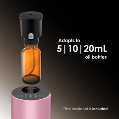 Compact pink KONCHILE diffuser fits in car cup holder for on-the-go scents.