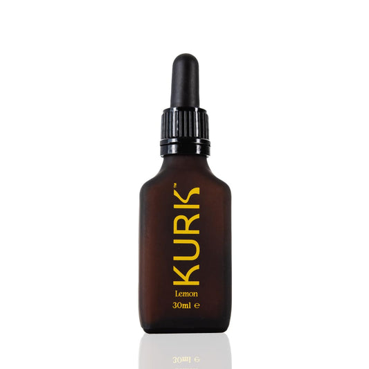 Kurk Essential lemon bottle pour—easy daily use for focus and energy.