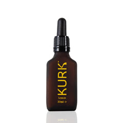 Kurk Essential lemon bottle pour—easy daily use for focus and energy.